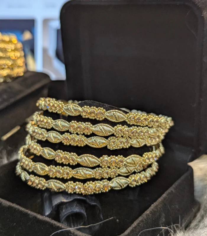 Golden Twirl" Sleek Stone Bangles